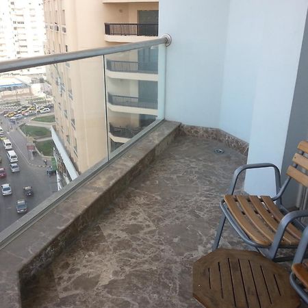 Hilton Alexandria Corniche Hotel Exteriér fotografie A balcony in a residential building in Cairo, Egypt